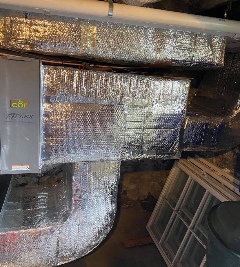Air handler and insulated ductwork installed by Peabody Huggins