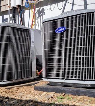 Two new central air condensers installed by Peabody Huggins
