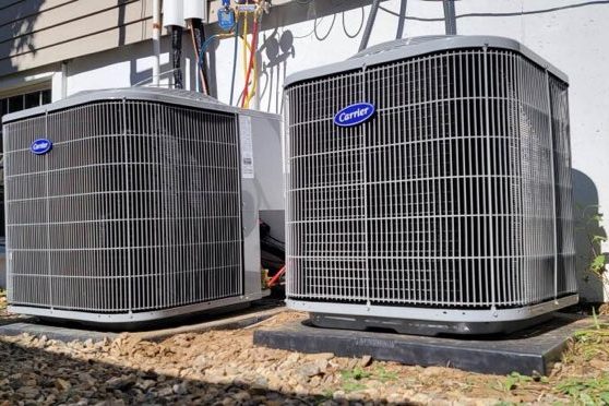 Two new central air condensers installed by Peabody Huggins